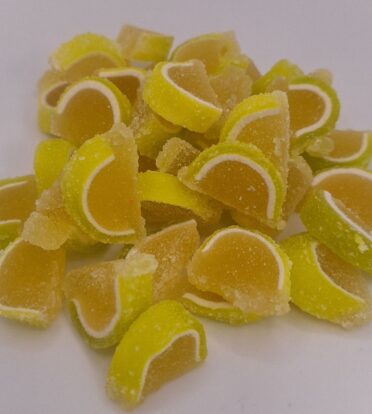 Mini bright colored key lime fruit jelly slices